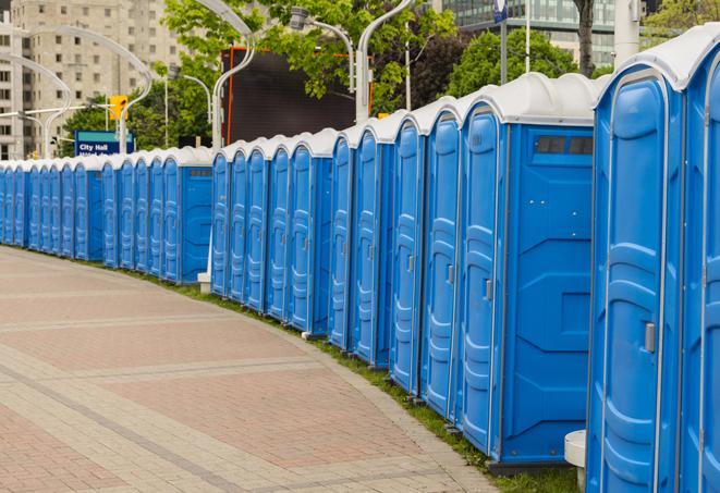 a row of portable restrooms at an outdoor special event, ready for use in Beavercreek, OR